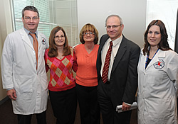 Researcher Manfred Boehm, M.D.; patients with ACDC Paula Allen and Louise Benge; UDP Director William Gahl, M.D., Ph.D.; and Researcher Cynthia St. Hilaire, Ph.D.