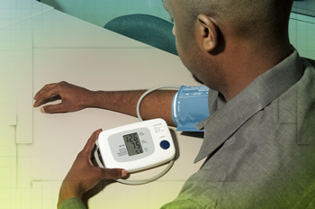 A patient with digital blood pressure meter