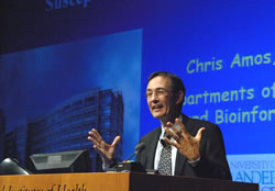 Chris Amos, Ph.D., at the Trent lecture podium