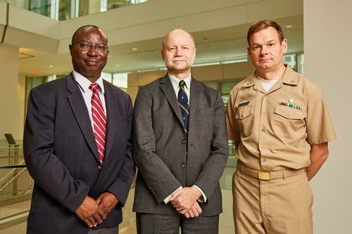 From Left: Adebowale Adeyemo, M.D., Max Muenke, M.D., and Paul Kruszka, M.D., co-created the Atlas of Human Malformation Syndromes in Diverse Populations with collaborators around the world. Credit: Ernesto del Aguila III, NHGRI.