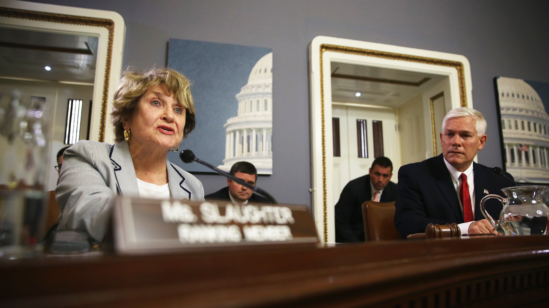 Committee ranking member Rep. Louise Slaughter (D-NY) (L) speaks as committee chairman Rep. Pete Sessions (R-TX) (R) looks on duirng a House Rules Committee meeting August 1, 2014 on Capitol Hill in Washington, DC. The House came back on Friday, a day after its scheduled summer recess, trying to finish up a border supplemental spending bill that was pulled from the floor the day before because of a shortage of votes. 