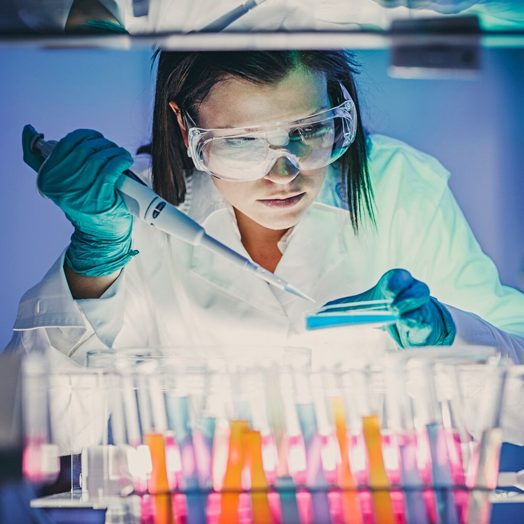Woman pipetting