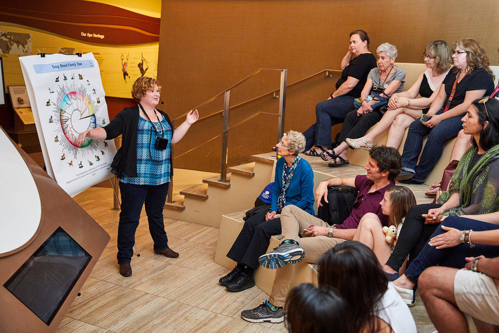 scientist giving a lecture in an indoor amphitheater