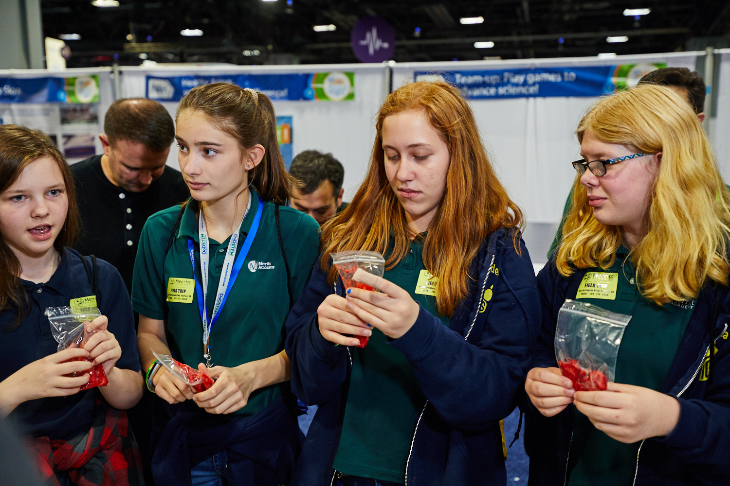 Girls participate in the Strawberry DNA extraction experiment