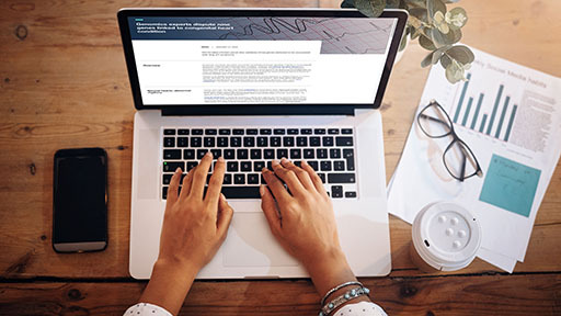 Person typing on laptop