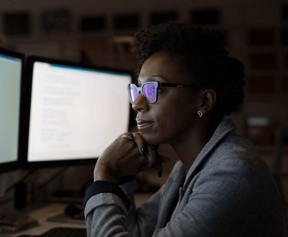 Black women looking at screen