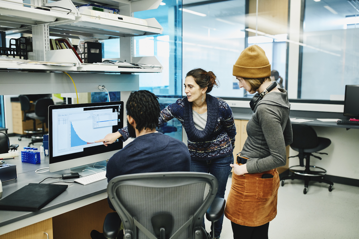 Staff in Lab Looking data