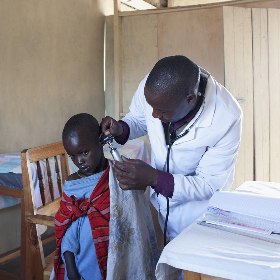 African doctor with a patient
