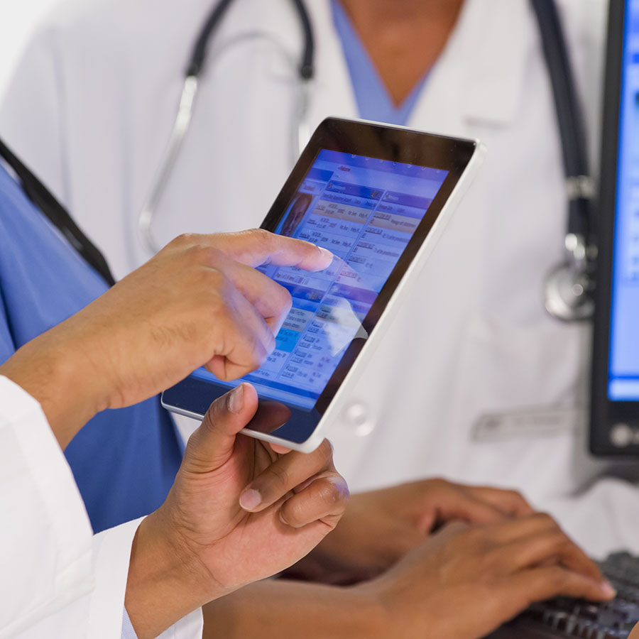 Doctors with a tablet