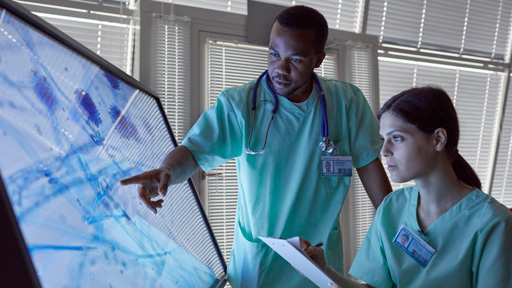 doctors looking a patient records