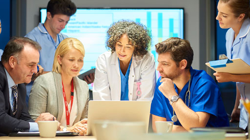 Staff, researchers and admin talking