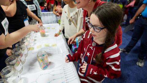 Child learns at a science fair