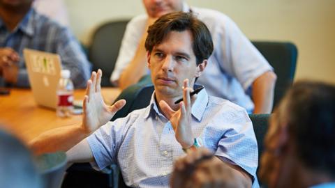 Man talking at meeting